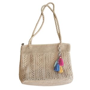 The Sak Crochet Boho Elegant Tan Woven Bag with Colorful Tassels